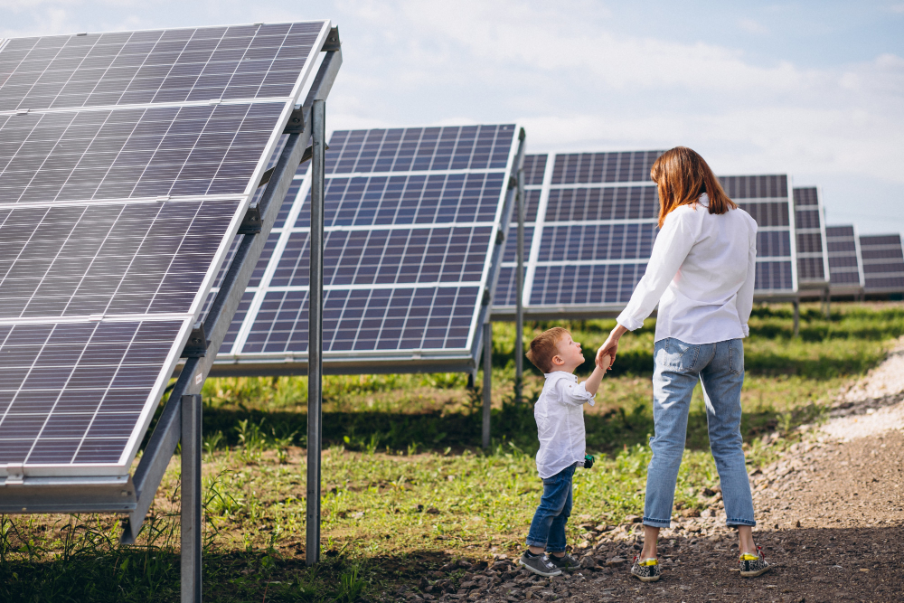 mother-with-her-little-son-by-solar-panels
